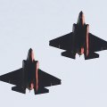 Naval Air Station Lemoore sent a pair of F-35s over Tiger Stadium.